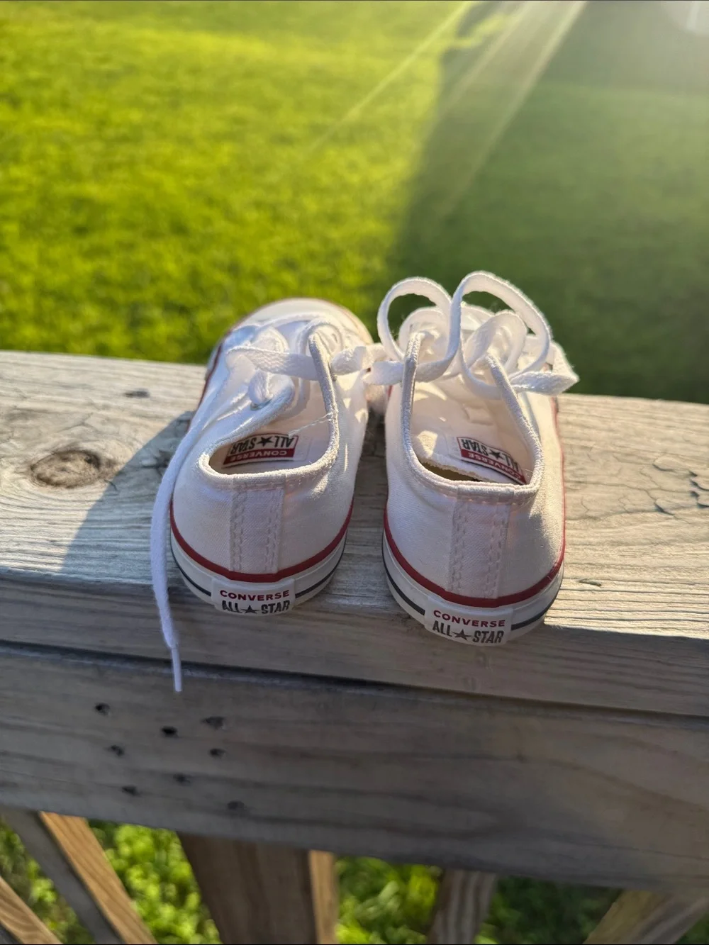 Converse White Low-Top Kids Sneakers with Red Trim